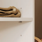 Armoire d'angle avec 2 tringles, un porte-pantalons et un rangement à chaussures